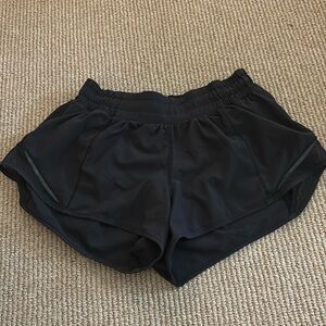 size 4! low rise 2.5 inseam! black hotty hots!! great condition!